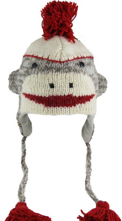 Funny sock monkey knit winter hat with ear flaps and tassels, a playful cold-weather accessory with classic nostalgic charm.