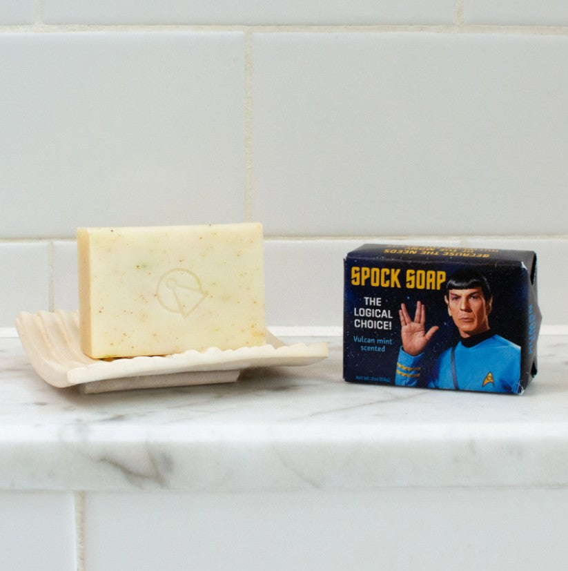 Spock Soap the Logical Choice. Soap wrapped in a Star Trek Themed wrapper showing Spock and an unwrapped bar of soap showing the vulcan insignia stamped into the bar.