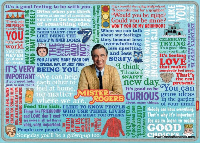 This vibrant 1000-piece puzzle from The Unemployed Philosophers Guild portrays a colorful collage akin to a jigsaw puzzle, showcasing Mister Rogers, the cherished children's television icon. He is depicted at the center with a warm smile and his iconic red sweater, surrounded by various quotes in different fonts and colors that emphasize themes of kindness, curiosity, and community.