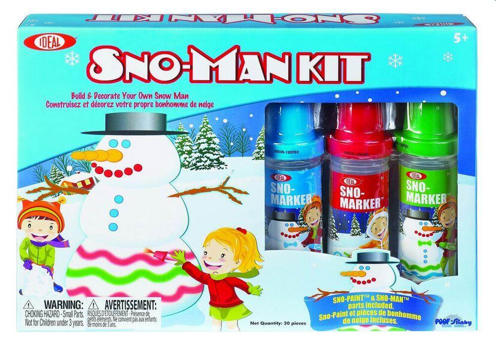 The Sno-Man Kit by Ideal features packaging with a cheerful snowman and three delighted children using the included red, blue, and green Sno-Markers to decorate it. The snowy backdrop with trees enhances the colorful design, making it perfect for an art kit aimed at children aged 5 and up.