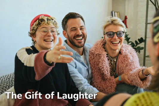 Friends sharing laughter together in a cozy living room, capturing the gift of laughter and connection during a joyful moment