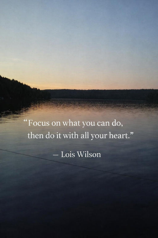 Lake at sunset with the quote “Focus on what you can do, then do it with all your heart” by Lois Wilson, shared in memory of a mother