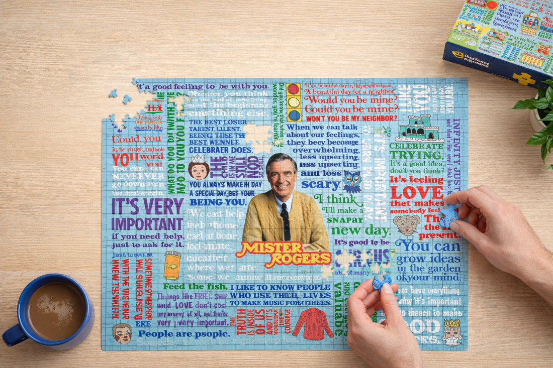 Cozy in-progress scene of a Mister Rogers jigsaw puzzle on a wooden table, celebrating National Puzzle Day with Danna Bananas in Canada.