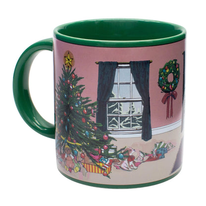 The Twas the Night before Christmas Heat-Changing Mug by Danna Bananas displays a lively festive scene, featuring a decorated tree, presents, and a wreath on the wall. Outside, you can see a snowy landscape through the window. The interior and handle are green, making it an excellent holiday gift.