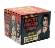 The packaging for the Rocky Horror Show Quote Mug by Danna Bananas features eye-catching illustrations of characters in striking red, black, and yellow colors. Ideal for any fan's collection, it humorously reminds you not to "judge a mug by its cover.