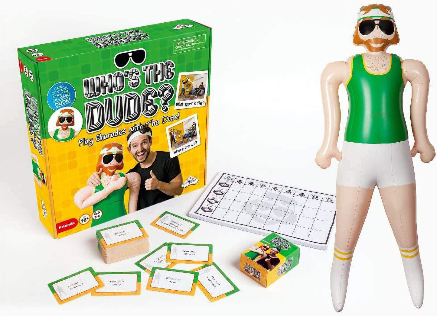 "Who's The Dude Party Charades Game with life-size inflatable doll, game box, score sheet, and charade cards displayed on a table"