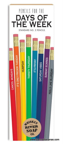 A vertical box of vibrant No. 2 pencils from Whiskey River Soap Co., titled "Pencils for Days of the Week." Each pencil comes with a witty phrase: Cancel Mondays, It's Only Tuesday, Hump Day, Thirsty Thursday, It's Friday, Saturday Vibes, and Sunday Scaries.
