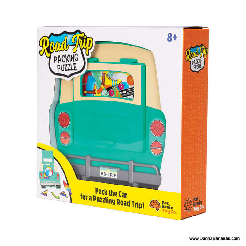 The box for the "Road Trip Packing Puzzle" by Outset Media features a teal car filled with vibrant objects and the logo at the top. This captivating brainteaser game is ideal for enhancing spatial reasoning skills and is designed for children aged 8 and above.