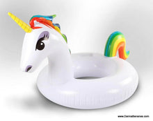 Introducing the Giant Unicorn Pool Float by Danna Bananas: A fantastical float with a rainbow mane and tail, boasting a white circular inflatable body and adorned with a shimmering golden horn, all set against a plain white background.